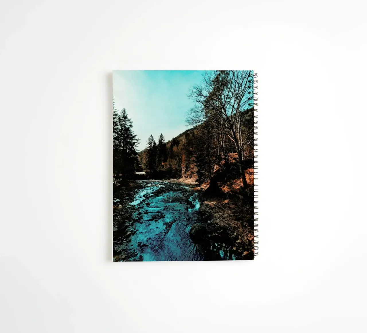 Idyllic River Through The Woods spiral notebook by Sebastian Hilgetag