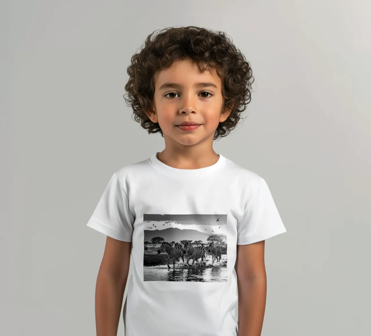 Troupeau de zèbres. Noir et blanc kids t-shirt by Thierry vobmann photography