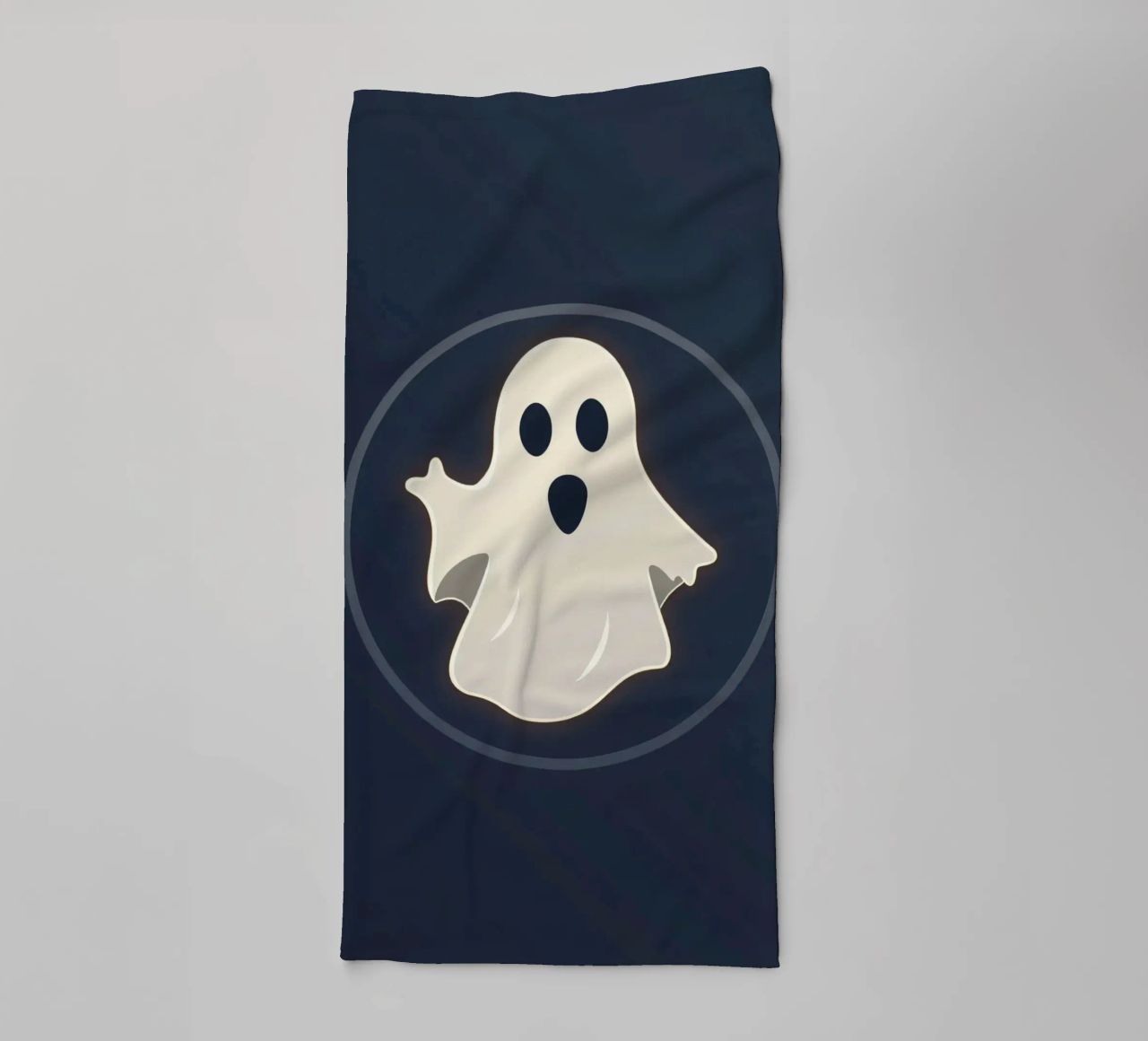 Cartoon ghost with surprised expression on dark background towel by DesignDoodle