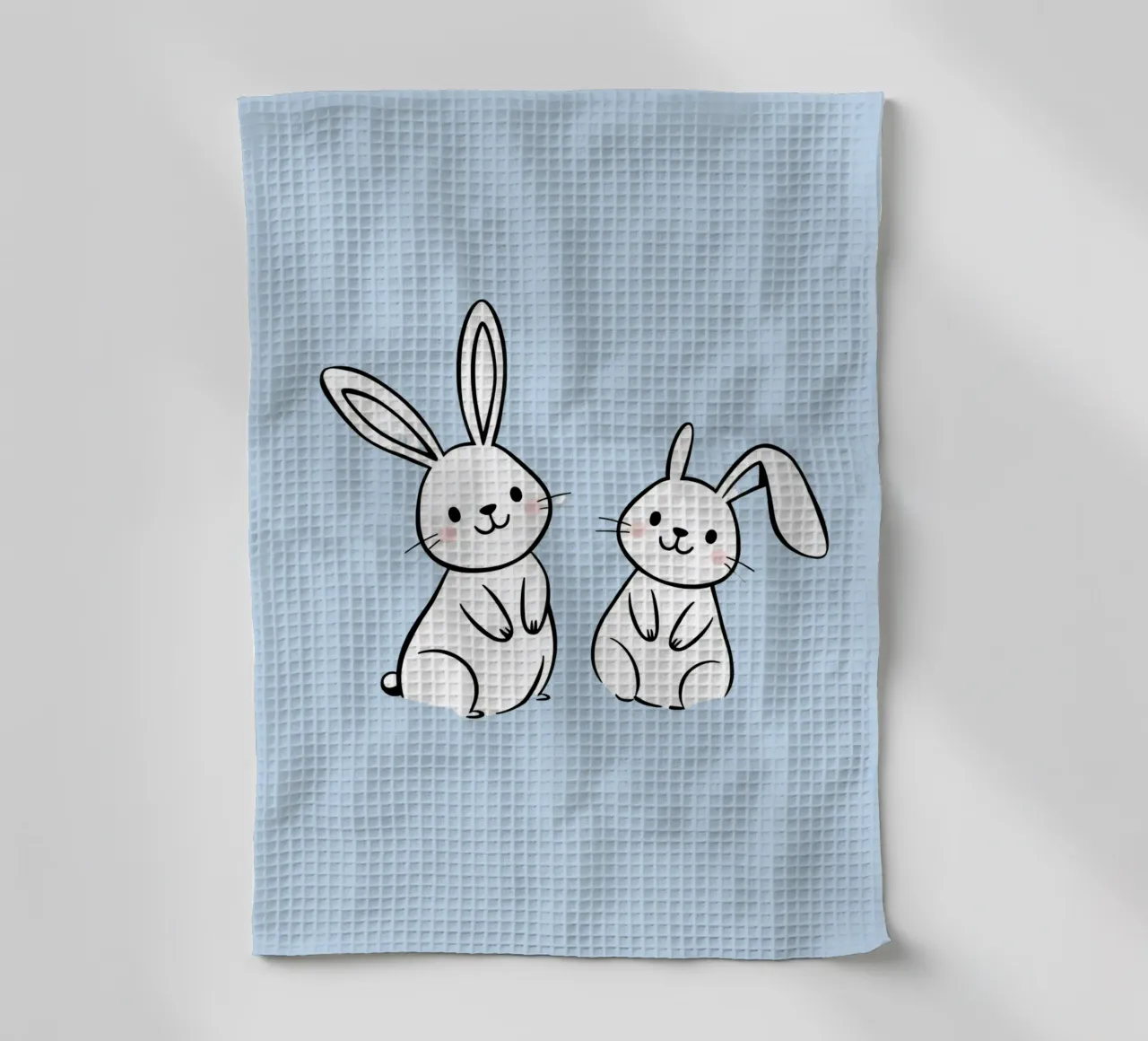 Deux adorables lapins se tenant l'un à côté de l'autre dans une œuvre d'art mignonne torchon de DesignDoodle