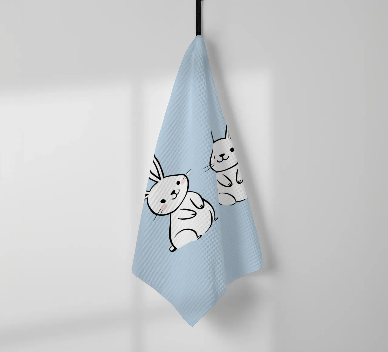 Deux adorables lapins se tenant l'un à côté de l'autre dans une œuvre d'art mignonne torchon de DesignDoodle