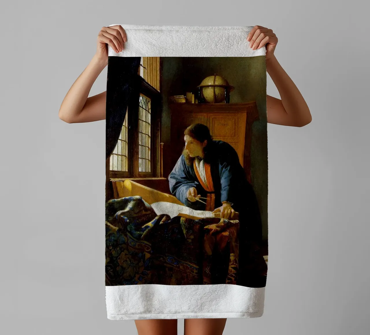 vermeer - a geographer studying maps towel by The Dinda