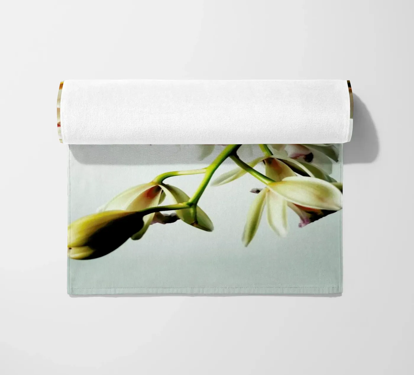 Tiny Orchids beach towel by Angelo Cerantola