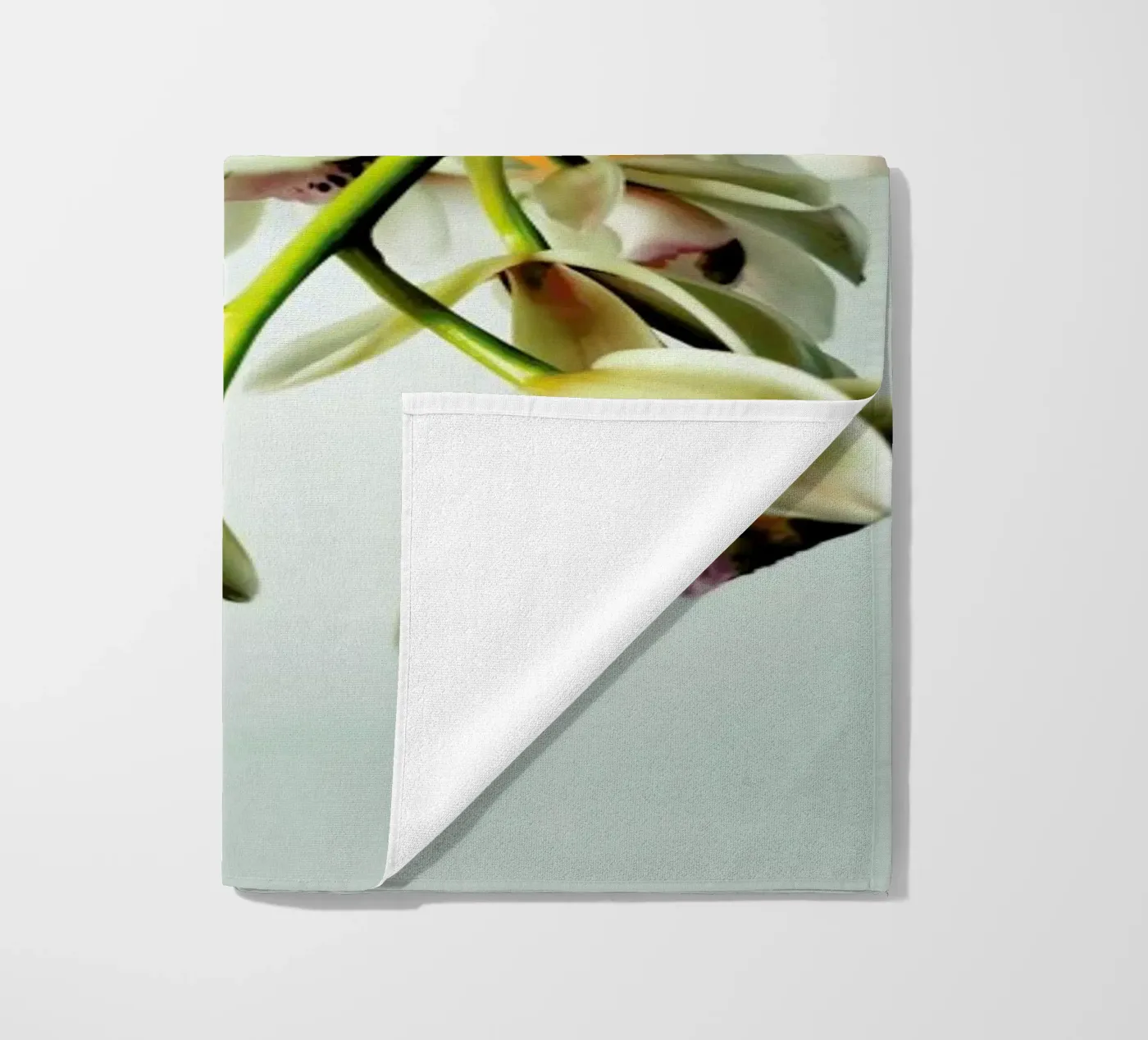 Tiny Orchids beach towel by Angelo Cerantola