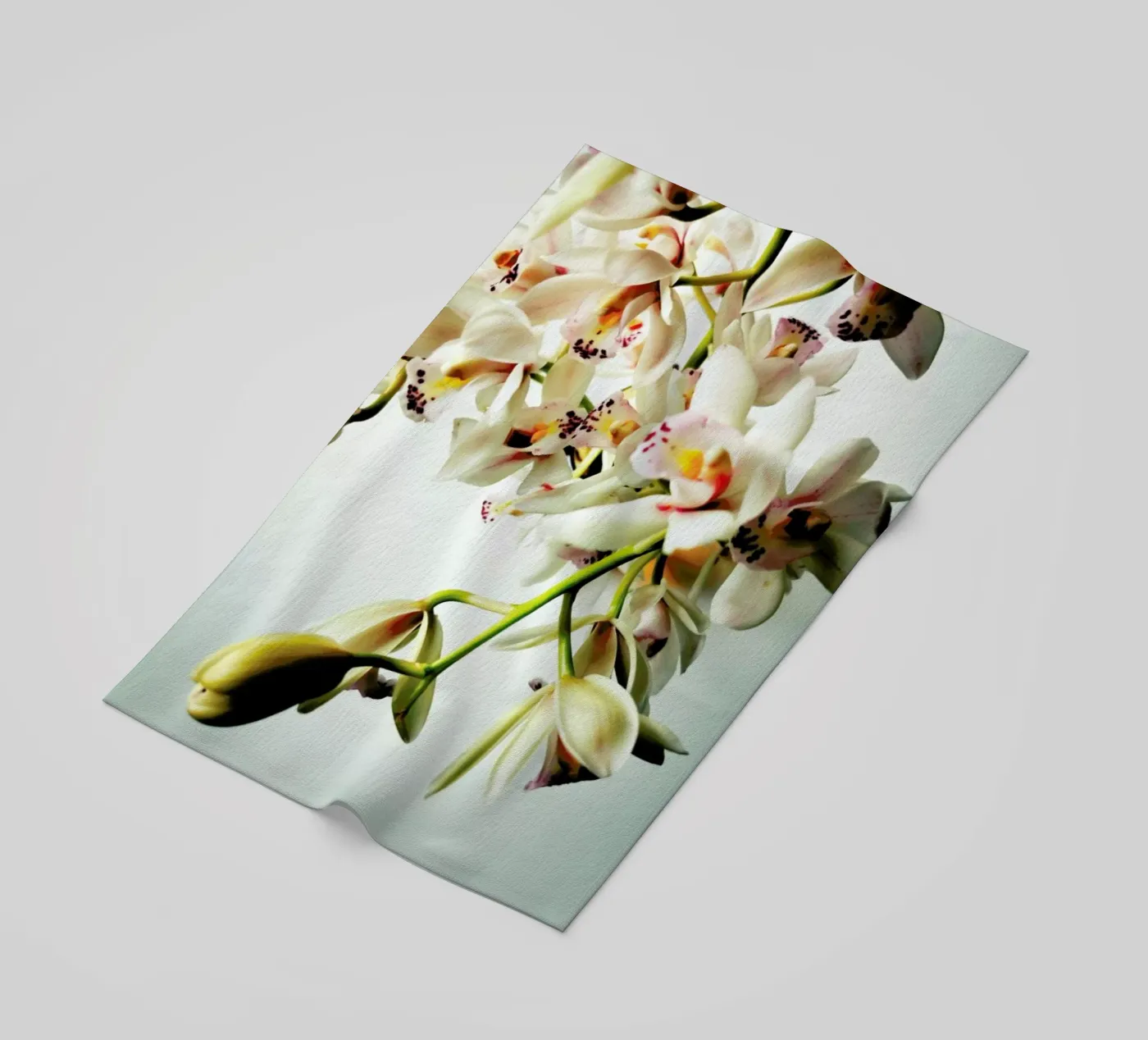 Tiny Orchids beach towel by Angelo Cerantola