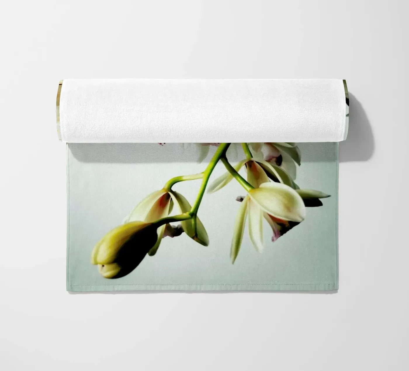 Tiny Orchids beach towel by Angelo Cerantola