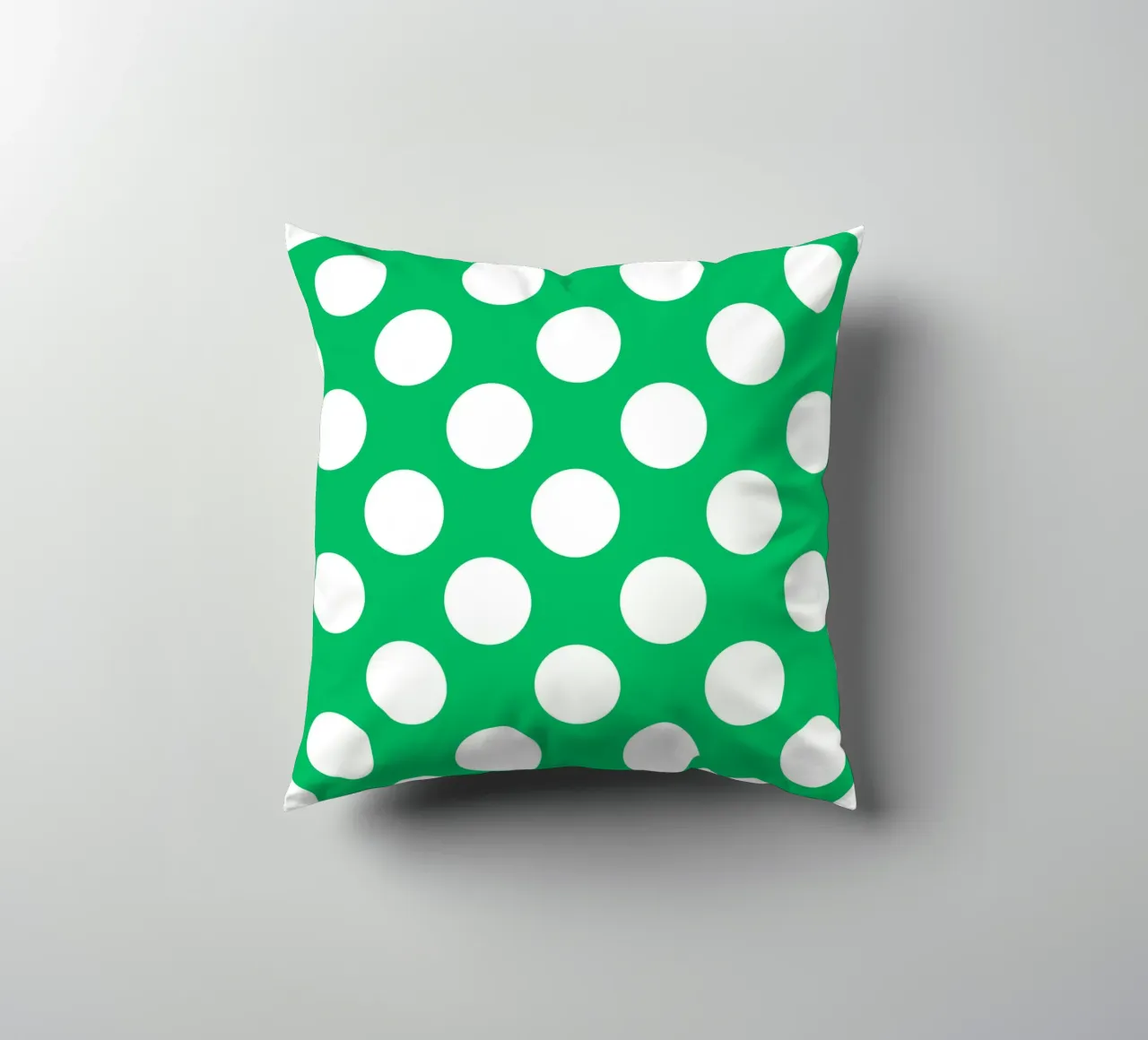 Polka Dots in Emerald Green decorative cushion by Happy Littles