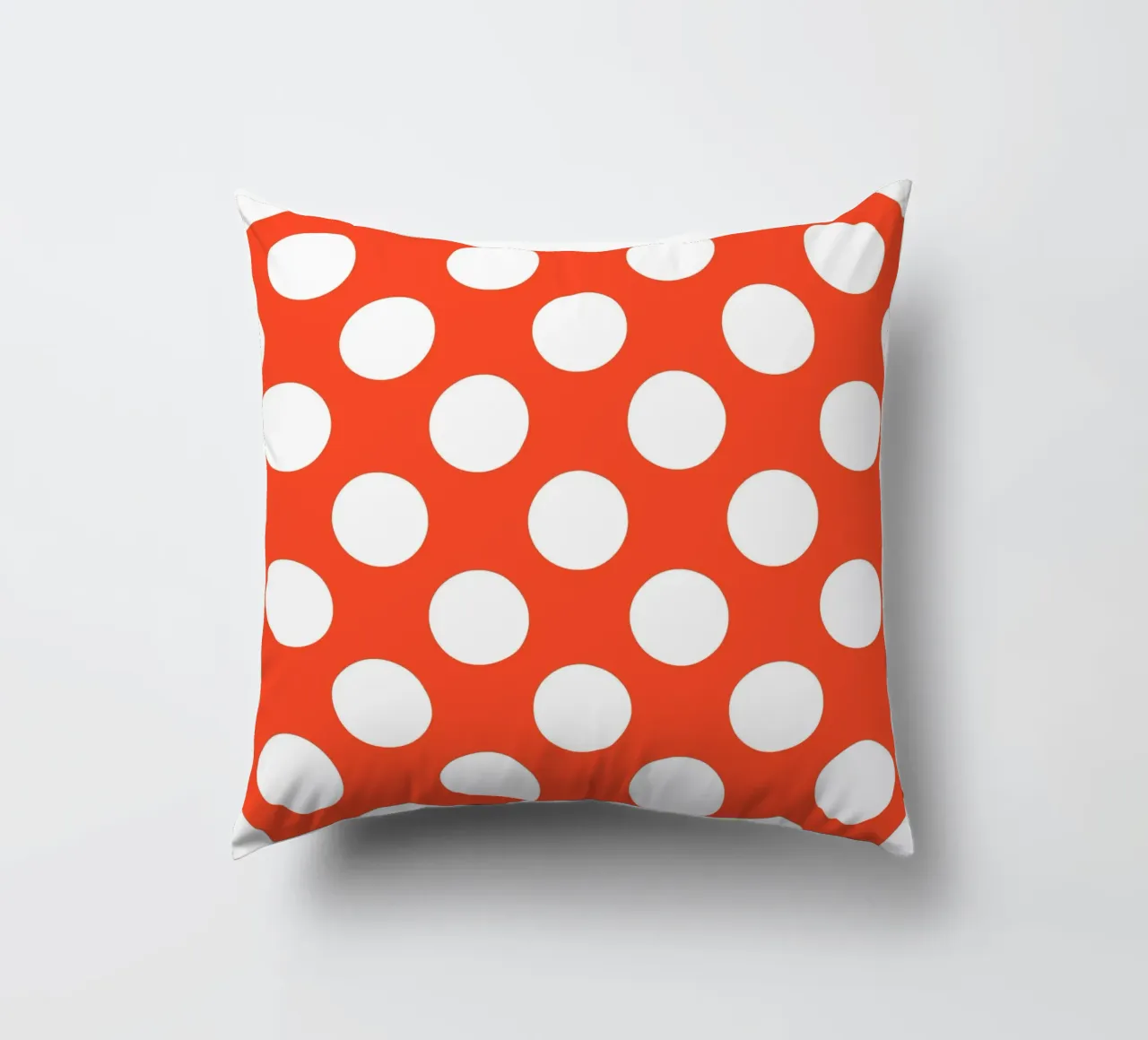 Polka Dots in Bright Orange decorative cushion by Happy Littles