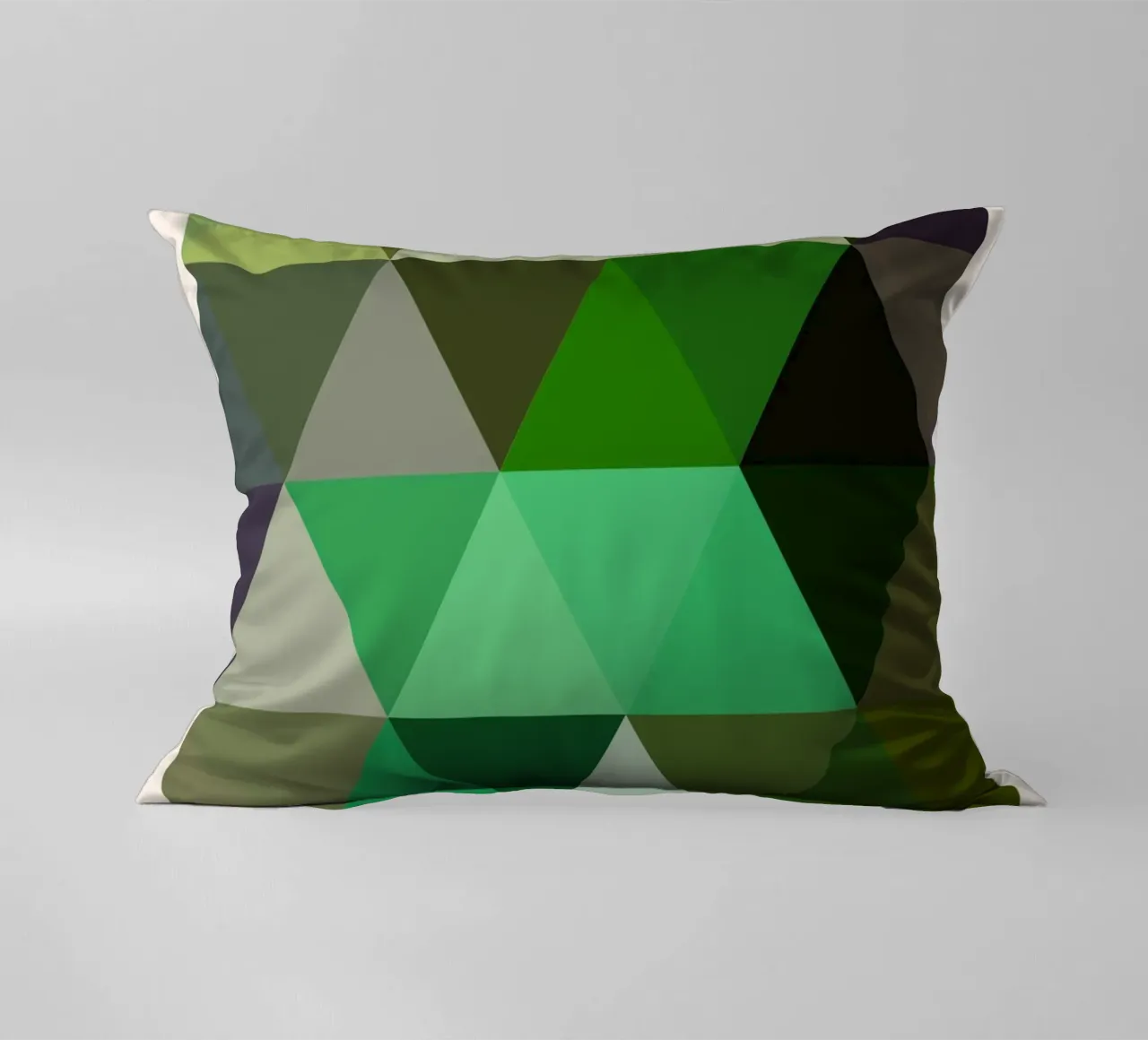 Bauhaus Evergreen: Triangoli geometrici, tendenza verde e terra cuscino da NorwesClub
