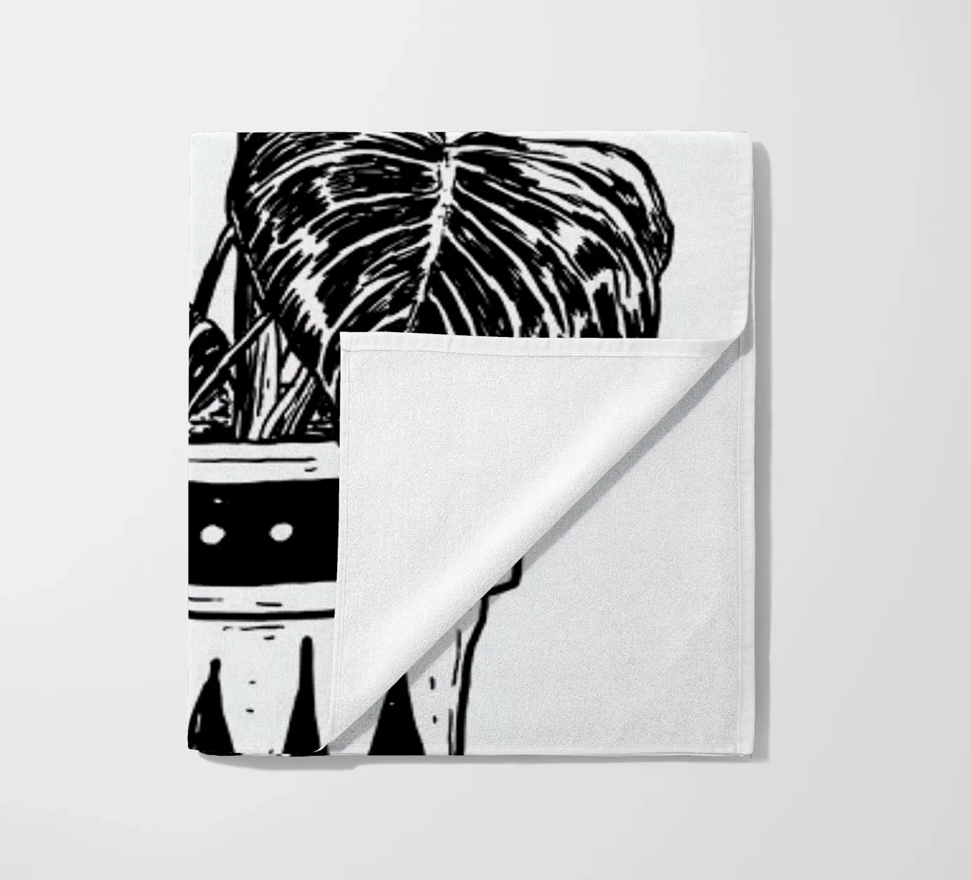 Monstera beach towel by Nick Cocozza