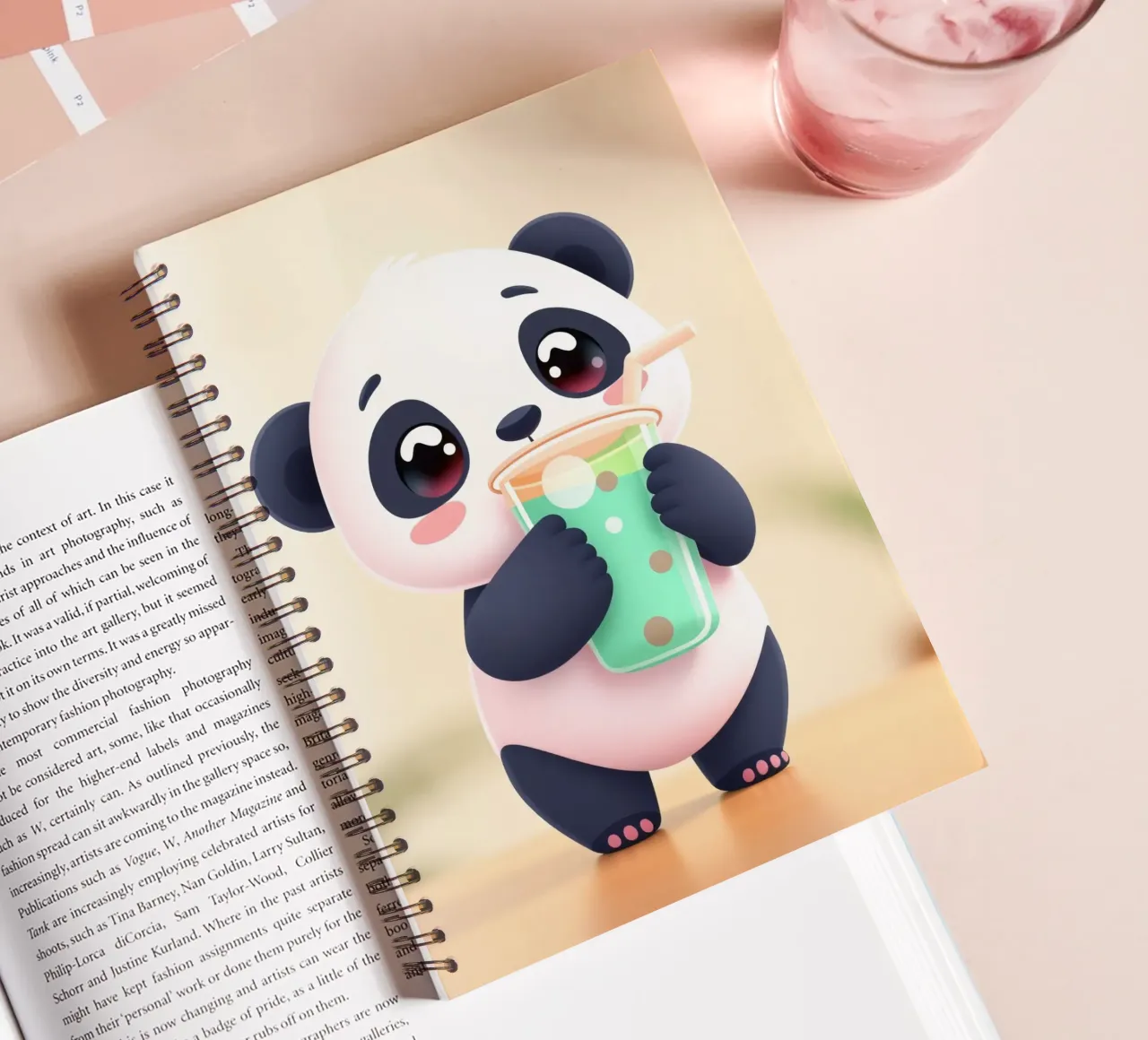 Cute panda character enjoying a colorful drink spiral notebook by DesignDoodle