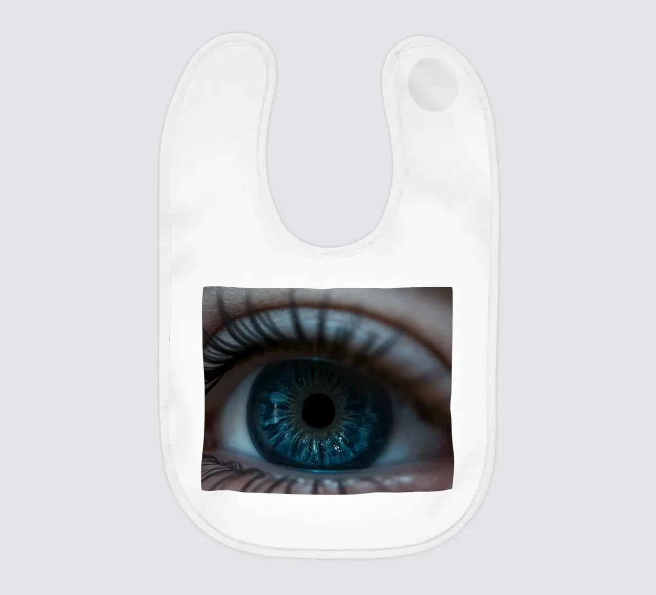 Eine Nahaufnahme eines blauen Auges, die komplizierte Details hervorhebt Babylätzchen von DesignDoodle