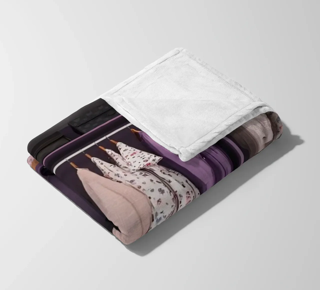 Organized closet with hanging clothes, storage bins fleece blanket by DesignDoodle