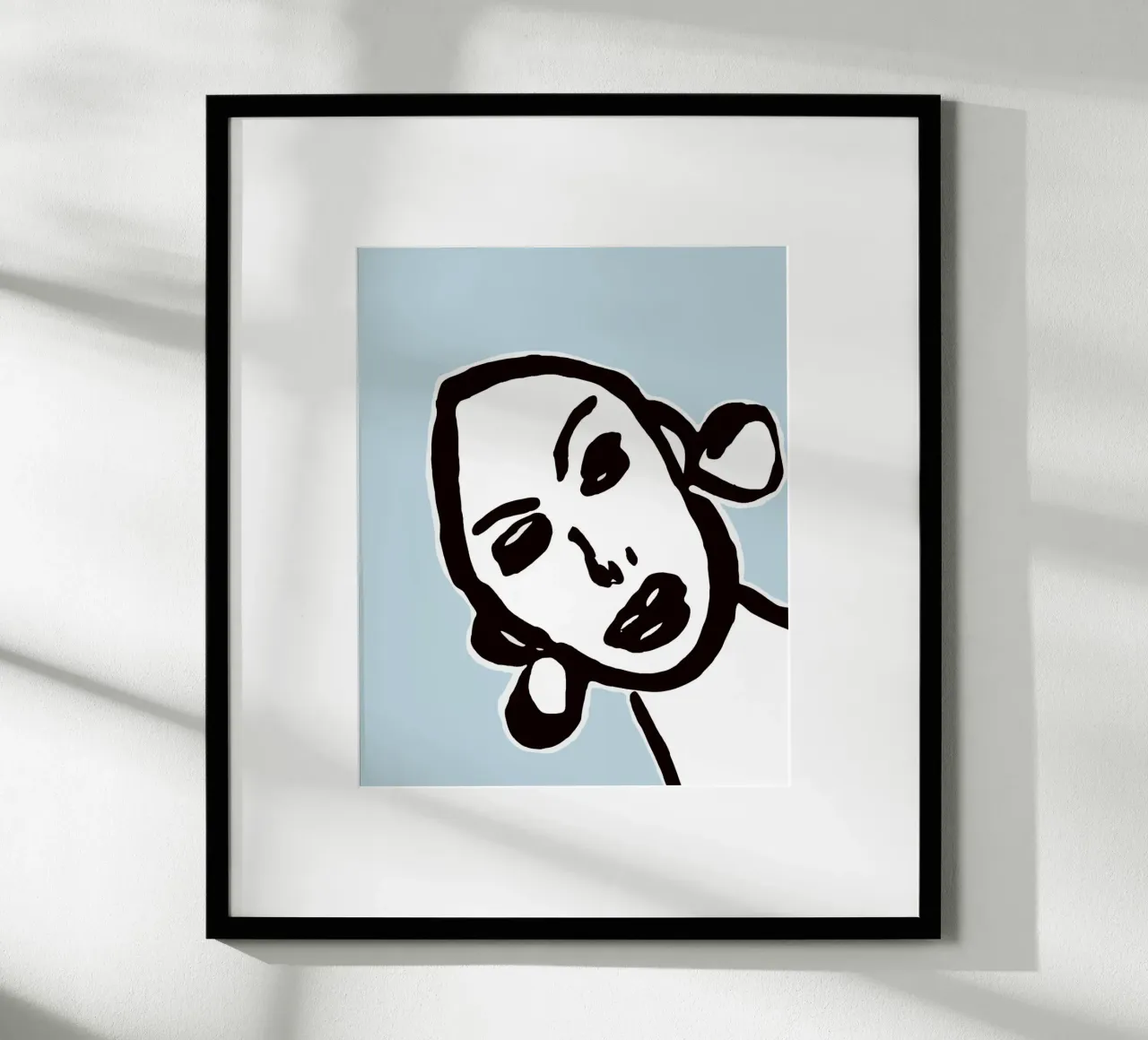 Ink Face poster con telaio in legno da typostudio