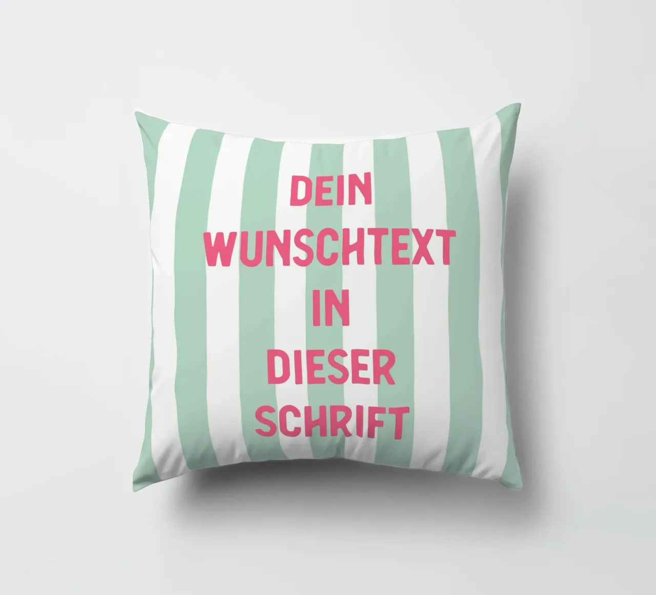 Wunschtext auf grünen Streifen decorative cushion by WORTSPIEL