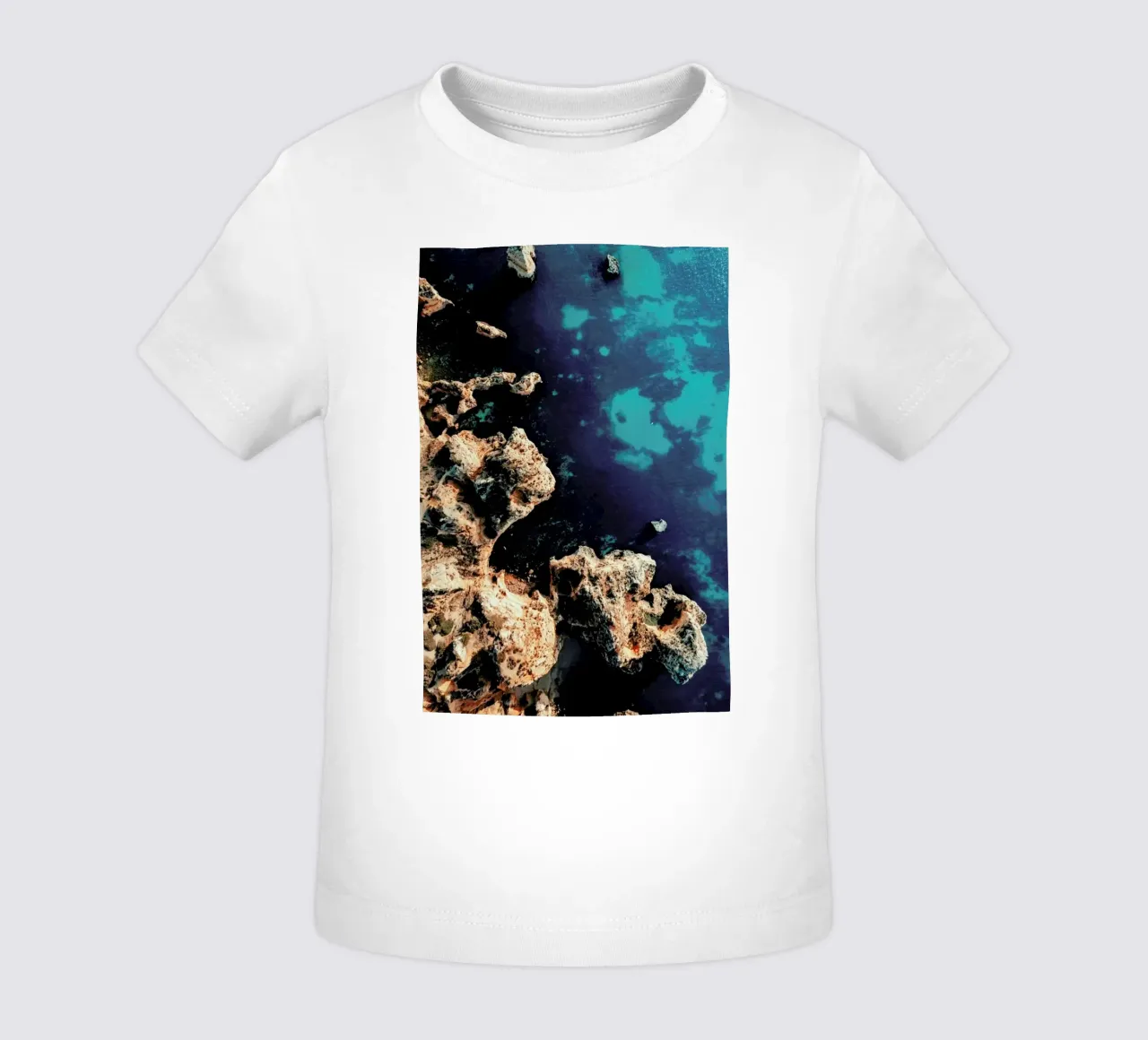 Coasts And Stones baby t-shirt by Sebastian Hilgetag