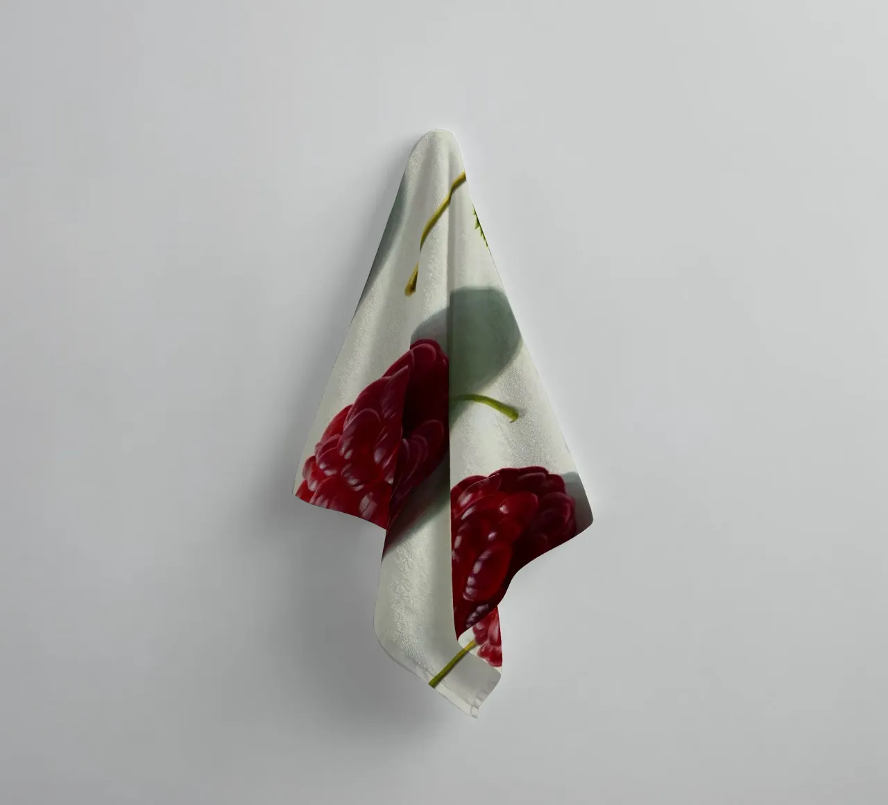 Freshly picked raspberries scattered on a light background towel by DesignDoodle