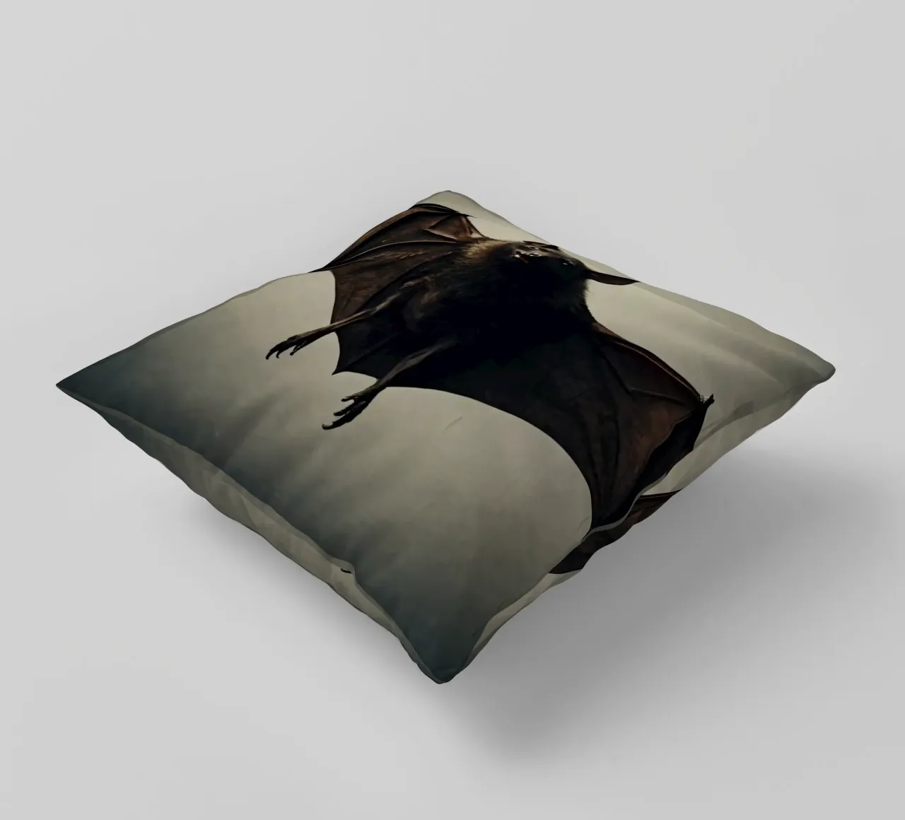Un pipistrello sospeso a mezz'aria che mette in mostra la sua impressionante apertura alare cuscino da DesignDoodle