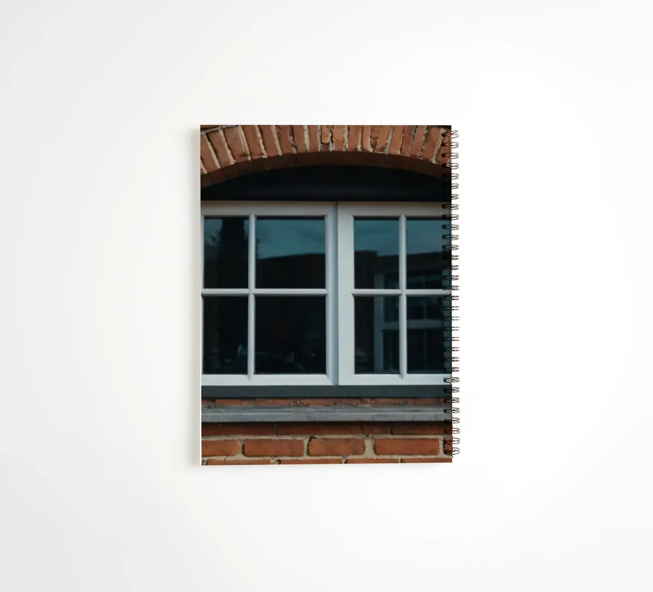 white framed window set in a rustic red brick wall spiral notebook by DesignDoodle