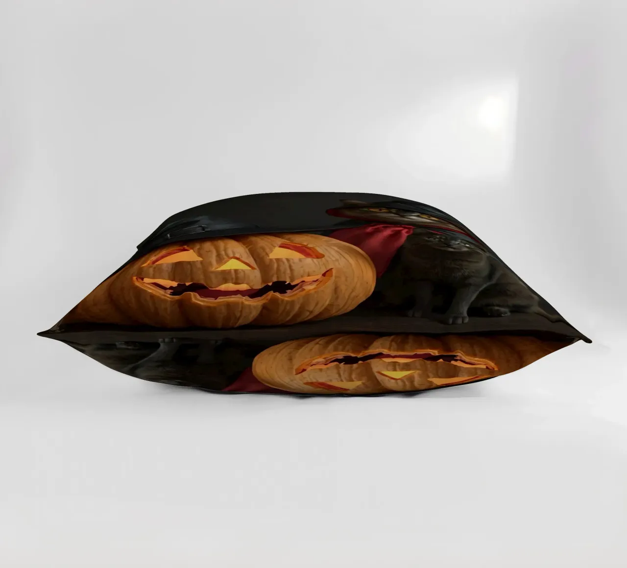 Gatti con cappelli da mago posano accanto a una zucca intagliata cuscino da DesignDoodle