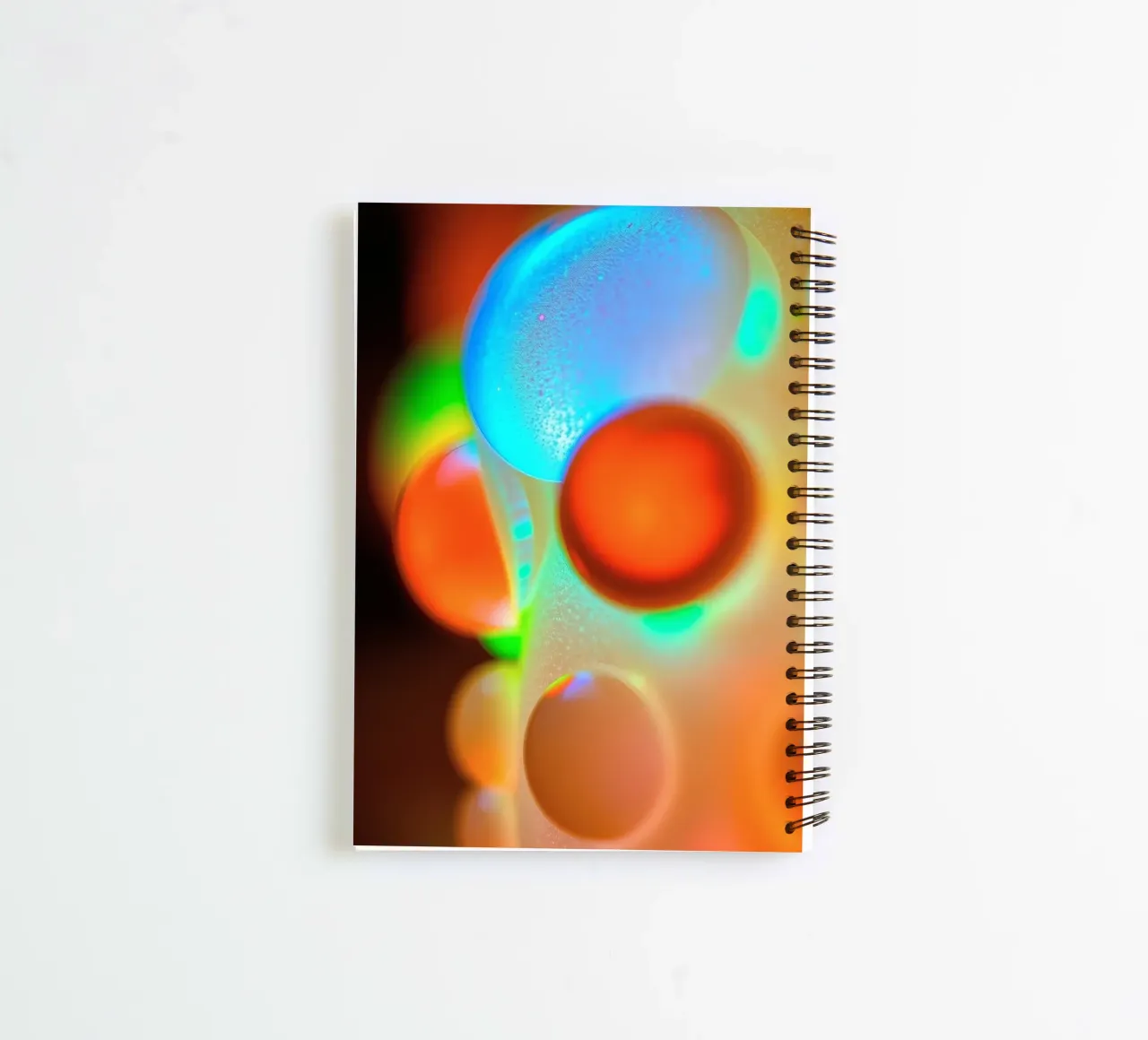 Colorful abstract design with illuminated bubbles spiral notebook by DesignDoodle