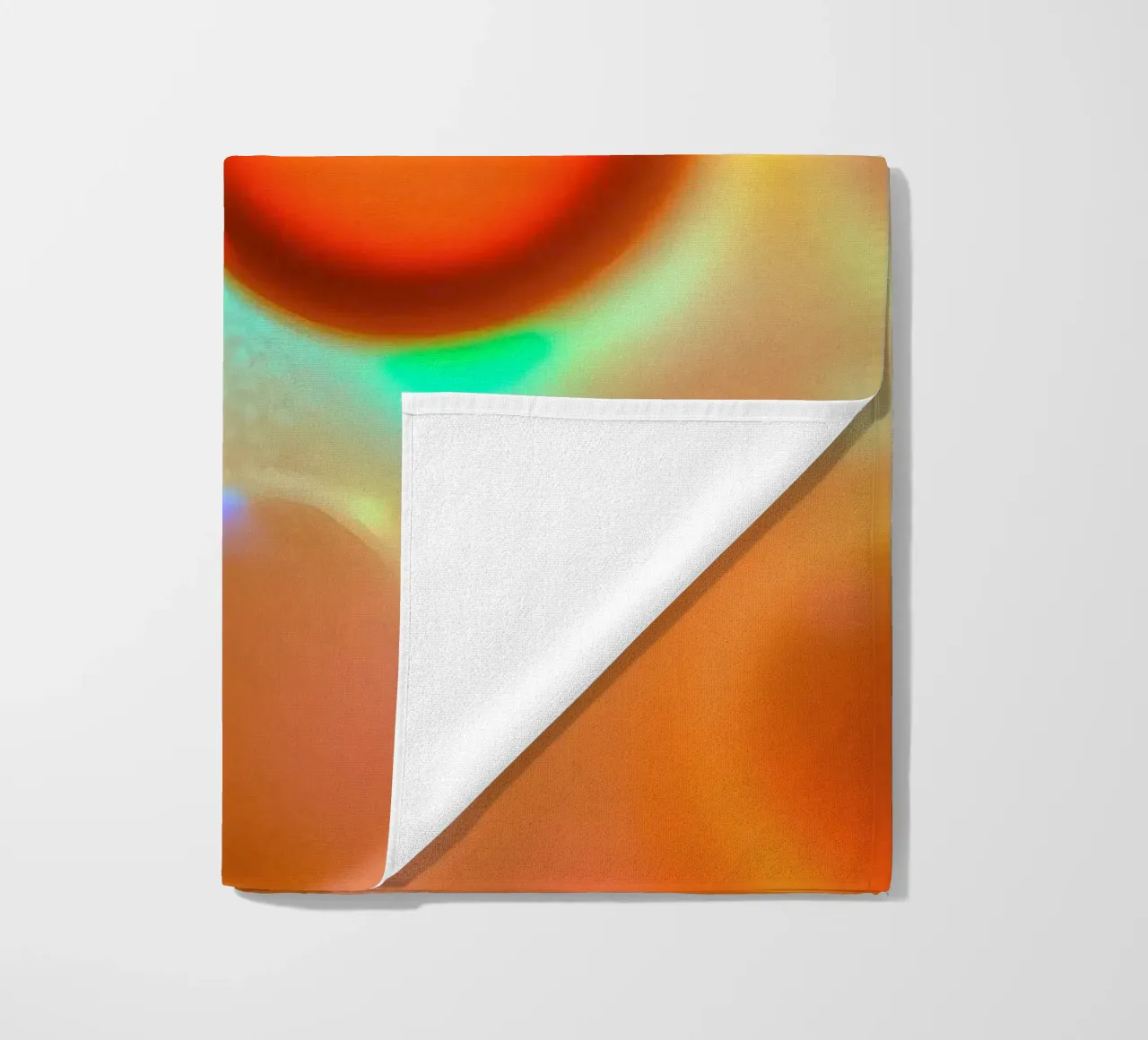 Colorful abstract design with illuminated bubbles beach towel by DesignDoodle