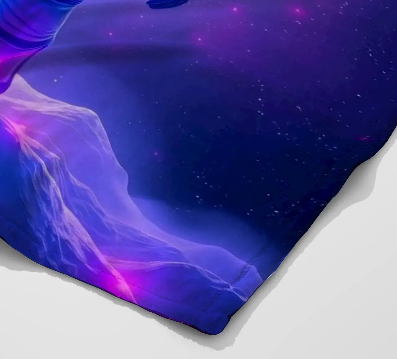Astronaut explores colorful galaxy backdrop fleece blanket by DesignDoodle
