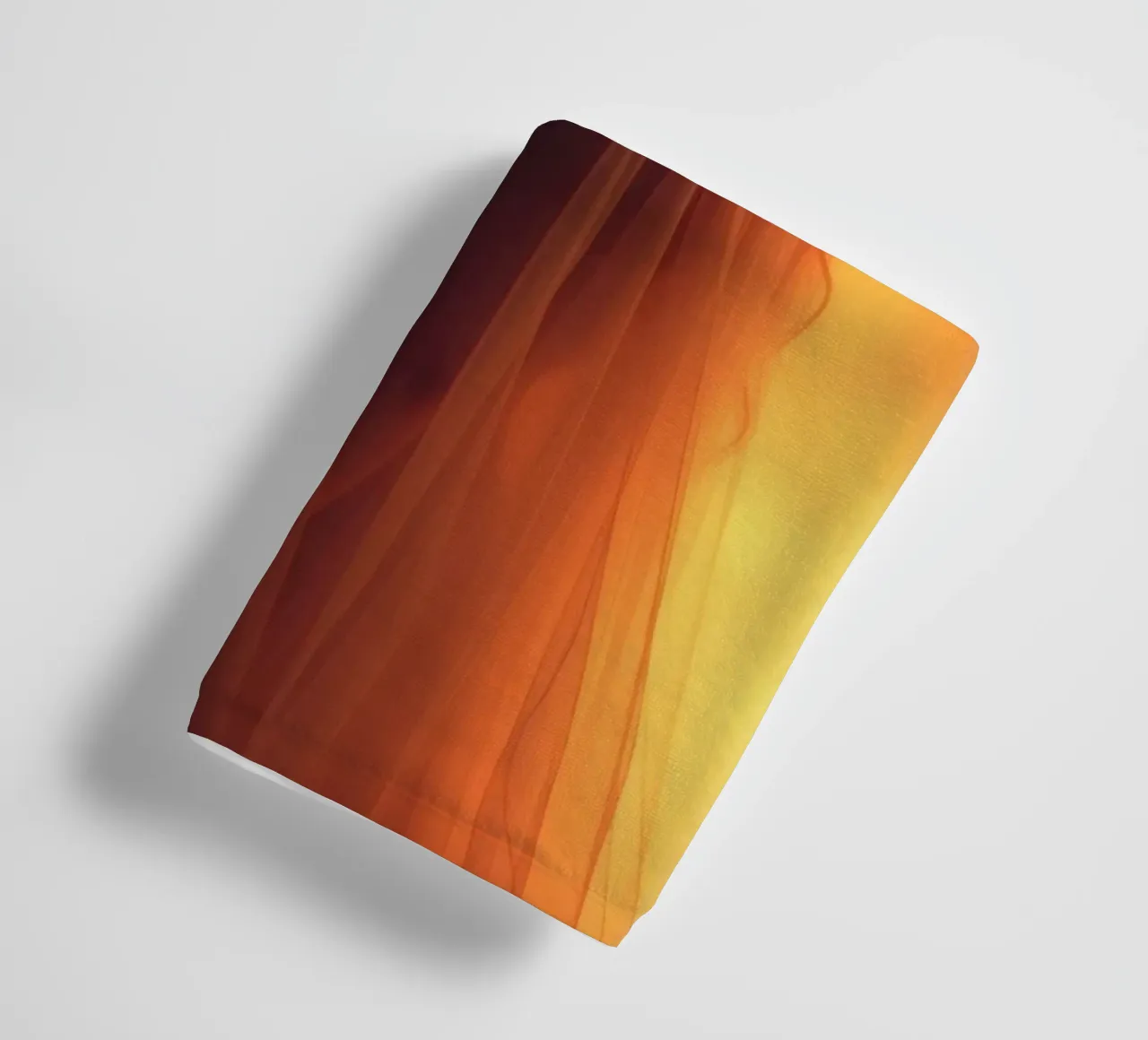 Elegant silhouette stands against a fiery background towel by DesignDoodle