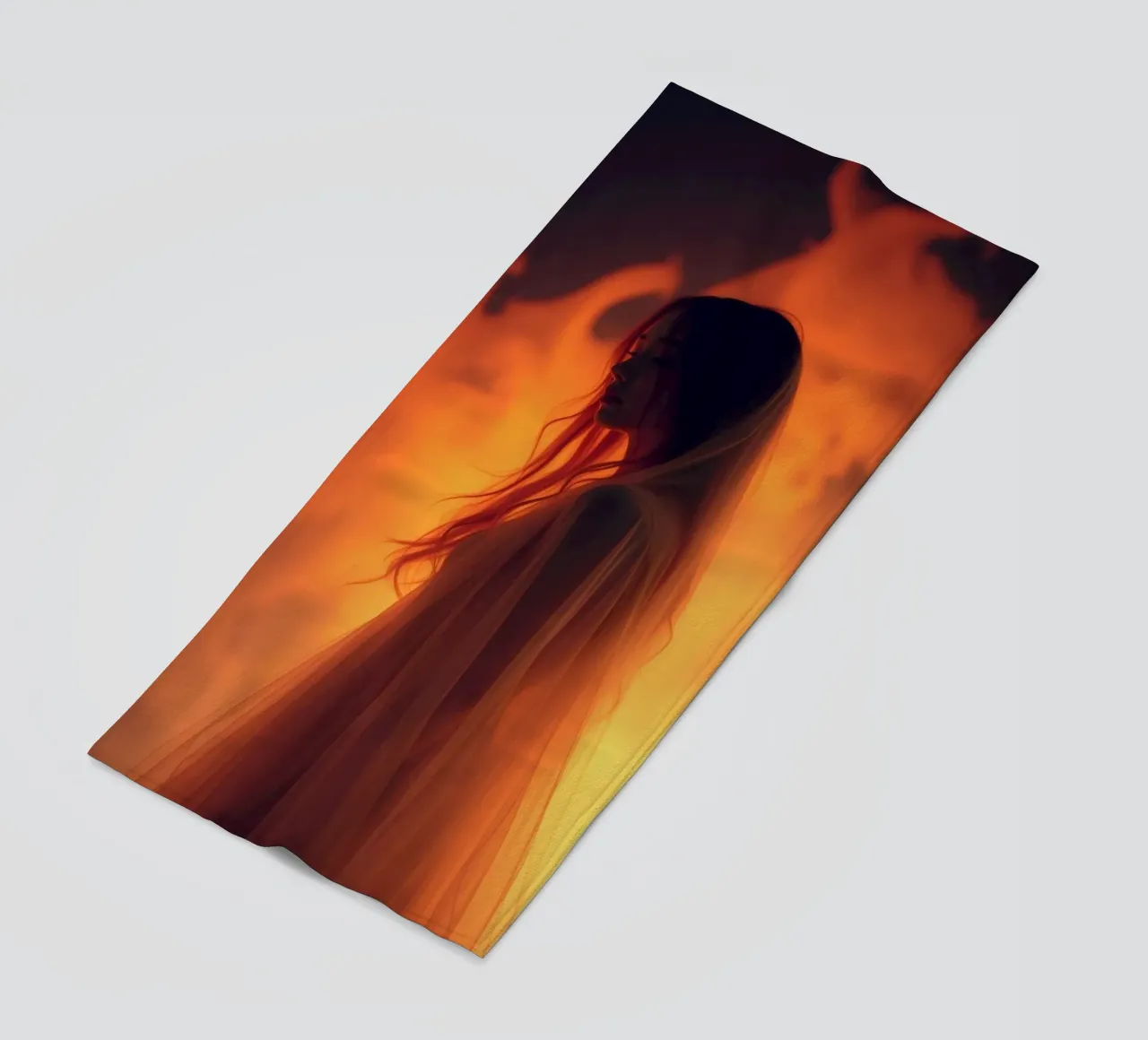 Elegant silhouette stands against a fiery background beach towel by DesignDoodle