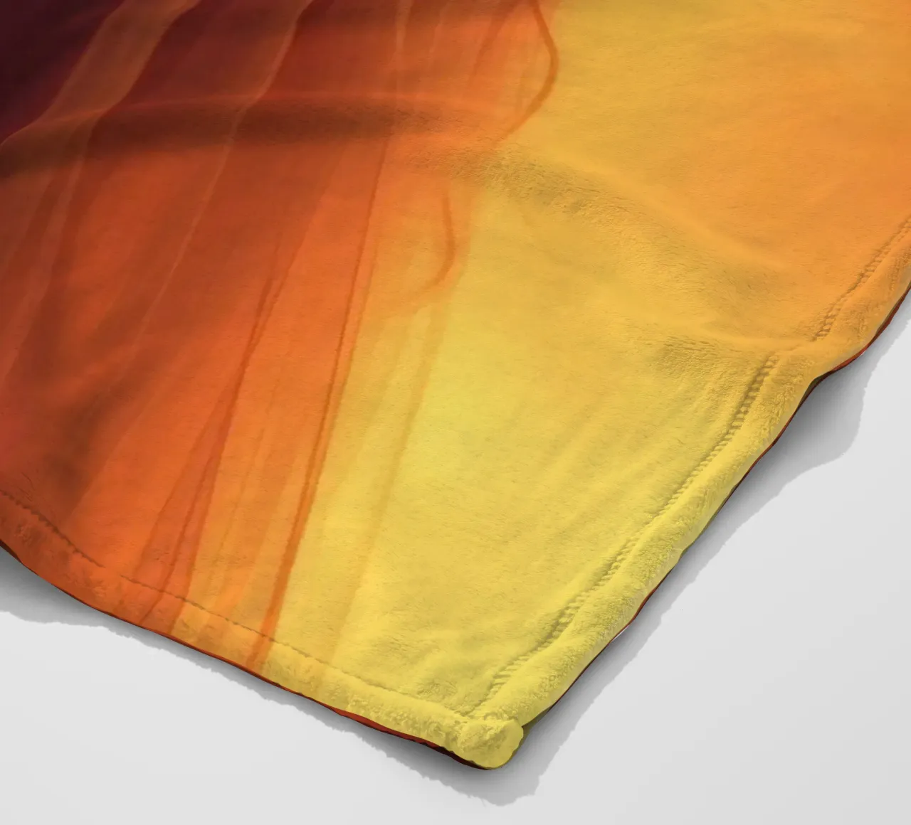 Elegant silhouette stands against a fiery background fleece blanket by DesignDoodle