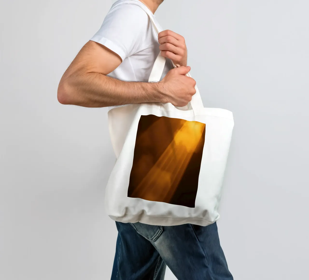 Abstract warm light rays filtering through a dark space tote bag by DesignDoodle
