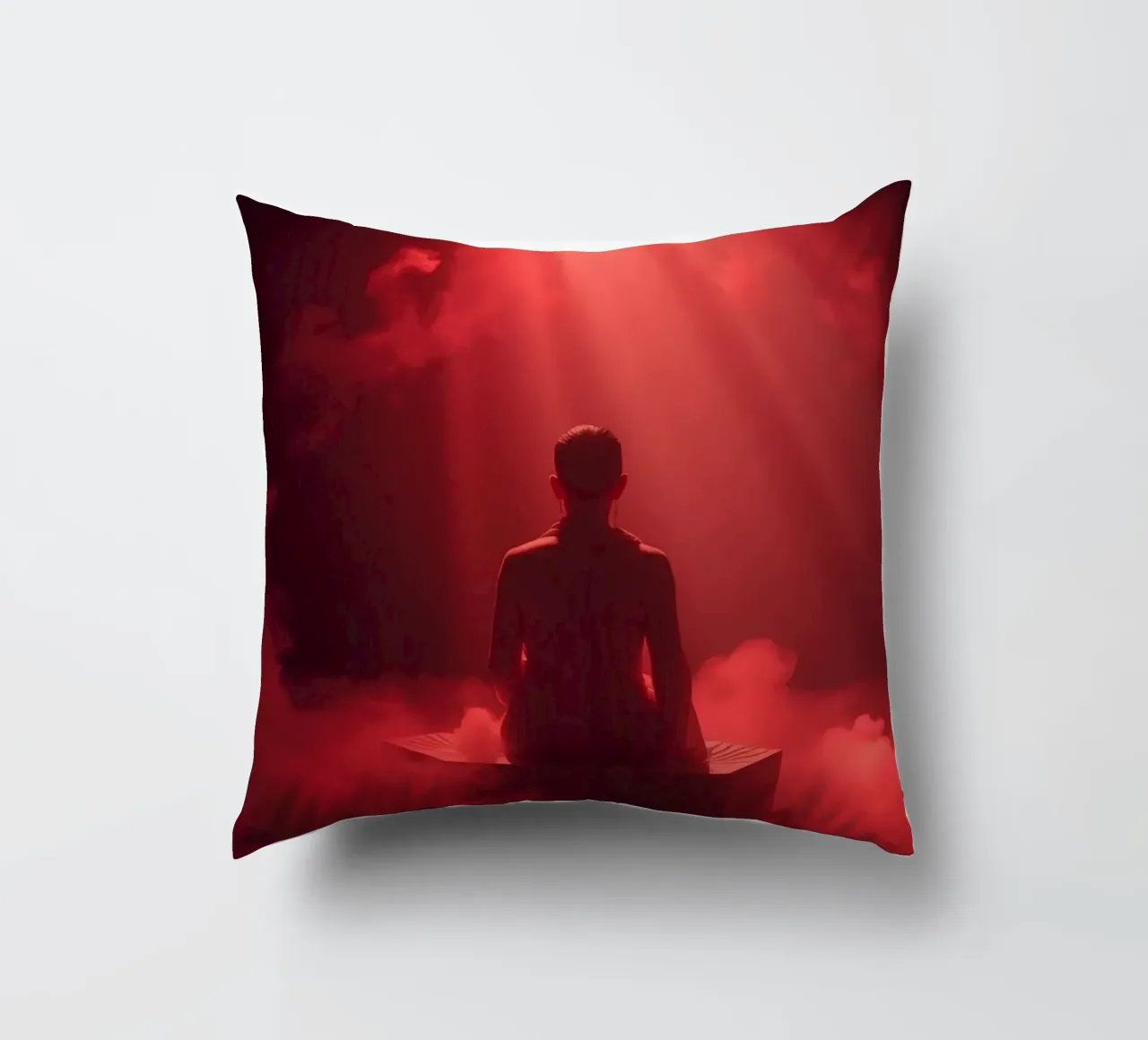 Captivating red light envelops a man sitting on a box in fog decorative cushion by DesignDoodle