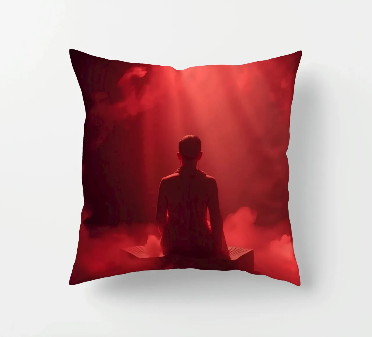 Captivating red light envelops a man sitting on a box in fog decorative cushion by DesignDoodle