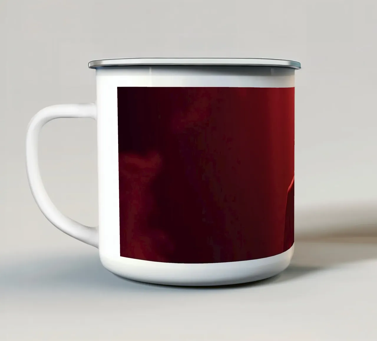 Captivating red light envelops a man sitting on a box in fog enamel mug by DesignDoodle