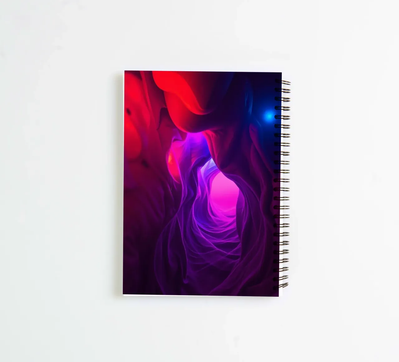 Vibrant abstract cave design creates a captivating wallart spiral notebook by DesignDoodle