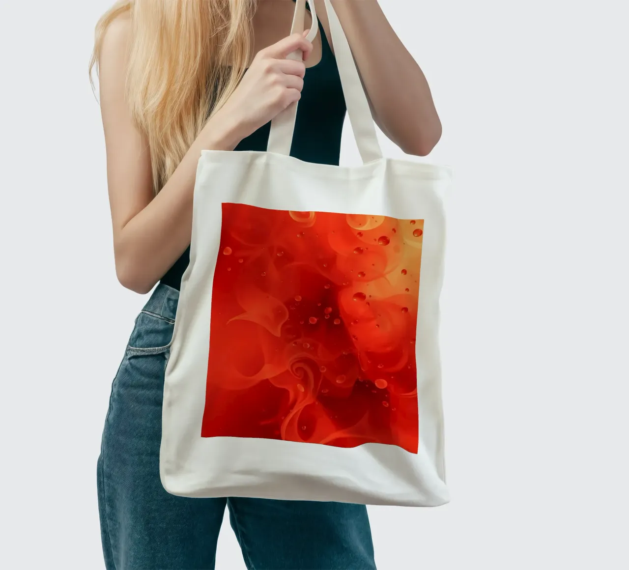 abstract swirling reds and yellows with soft bubbles tote bag by DesignDoodle