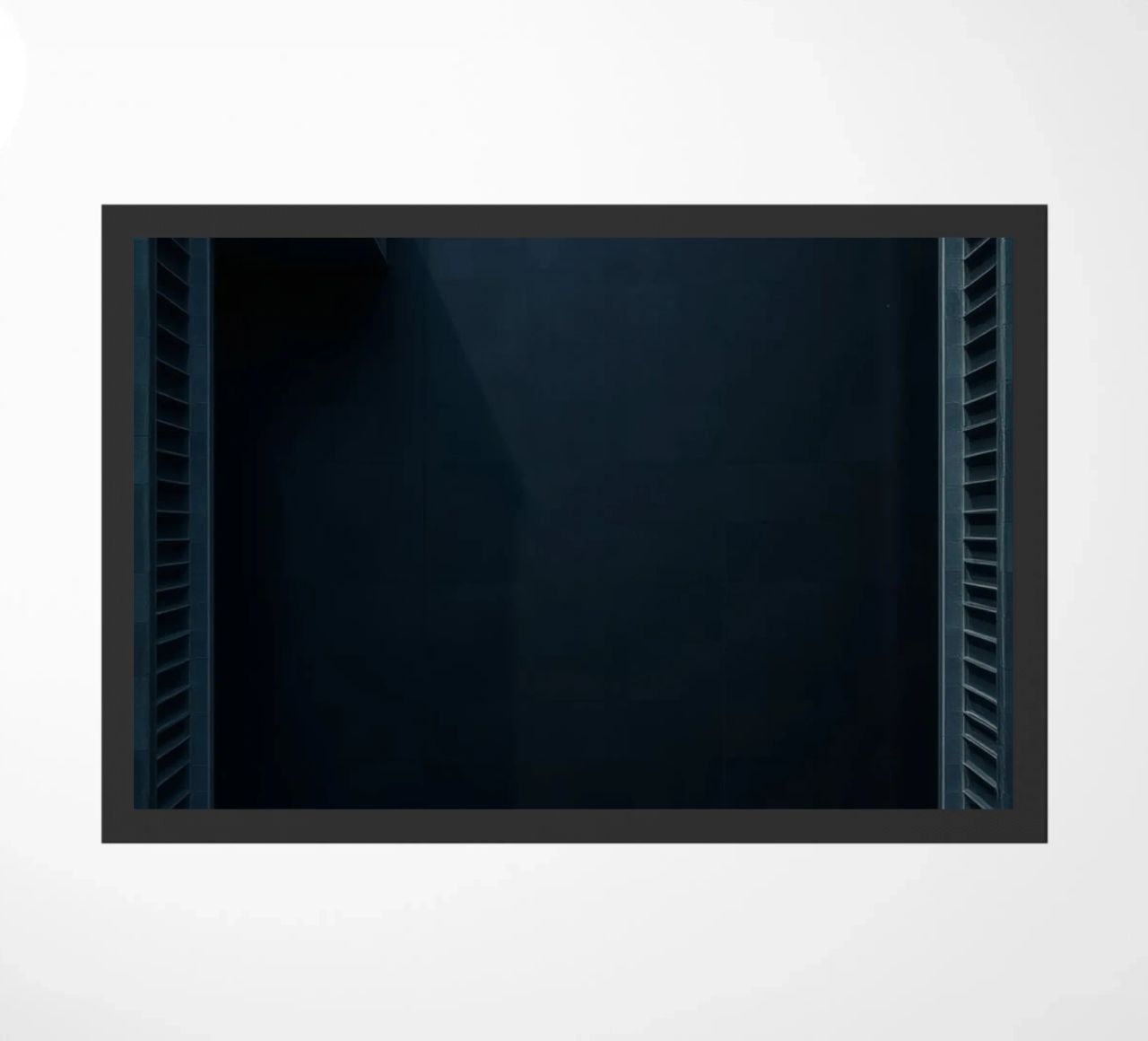 Elegant dark background featuring a minimalist chandelier doormat by DesignDoodle