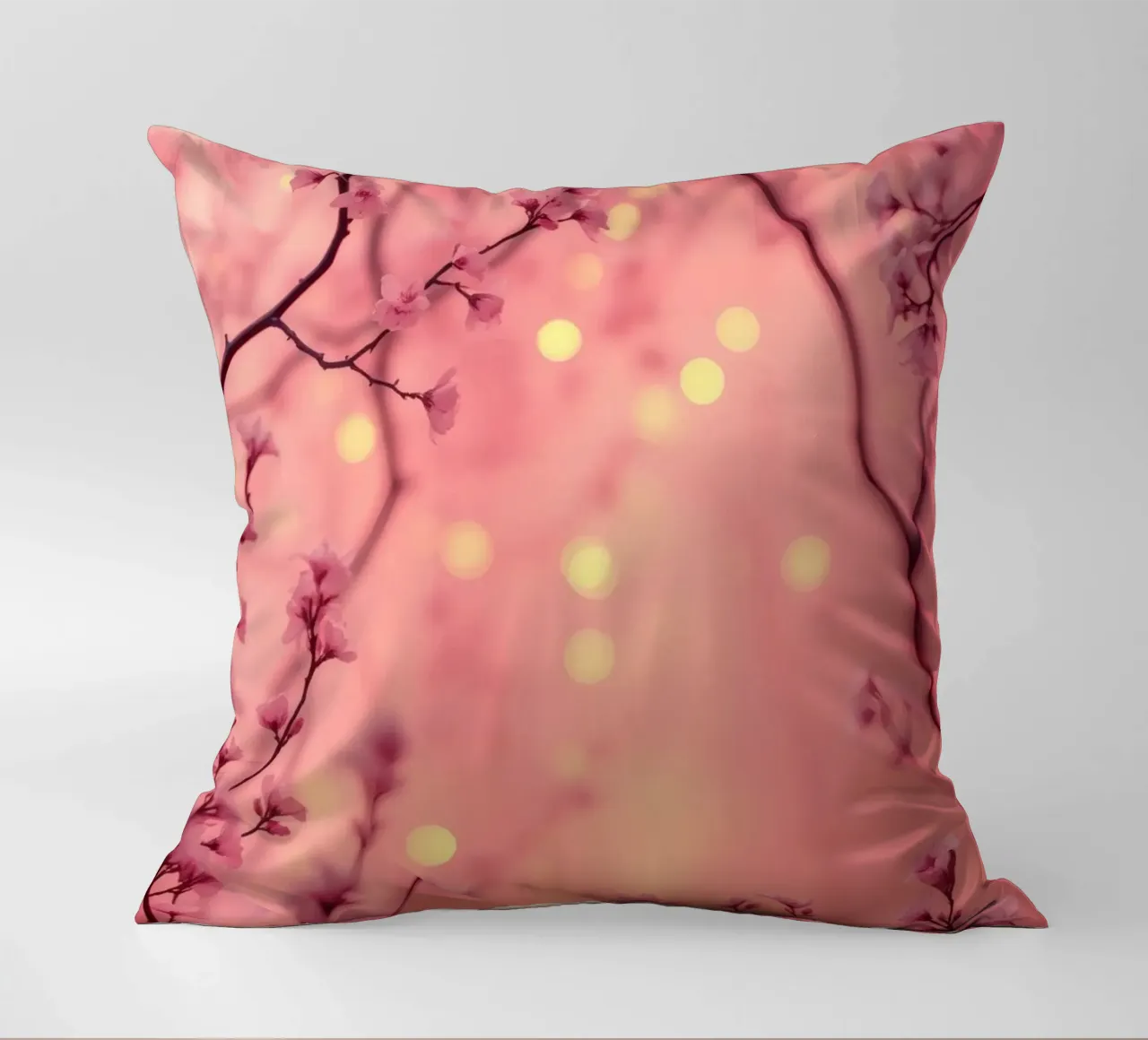 Delicate pink blossoms set against a dreamy bokeh background decorative cushion by DesignDoodle