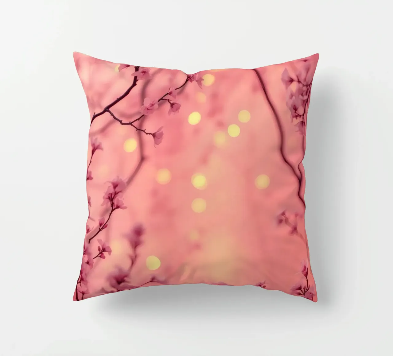 Delicate pink blossoms set against a dreamy bokeh background decorative cushion by DesignDoodle