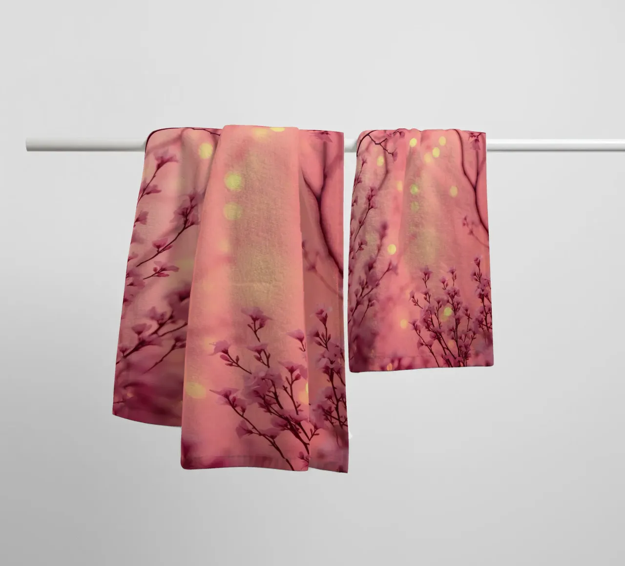 Delicate pink blossoms set against a dreamy bokeh background towel by DesignDoodle