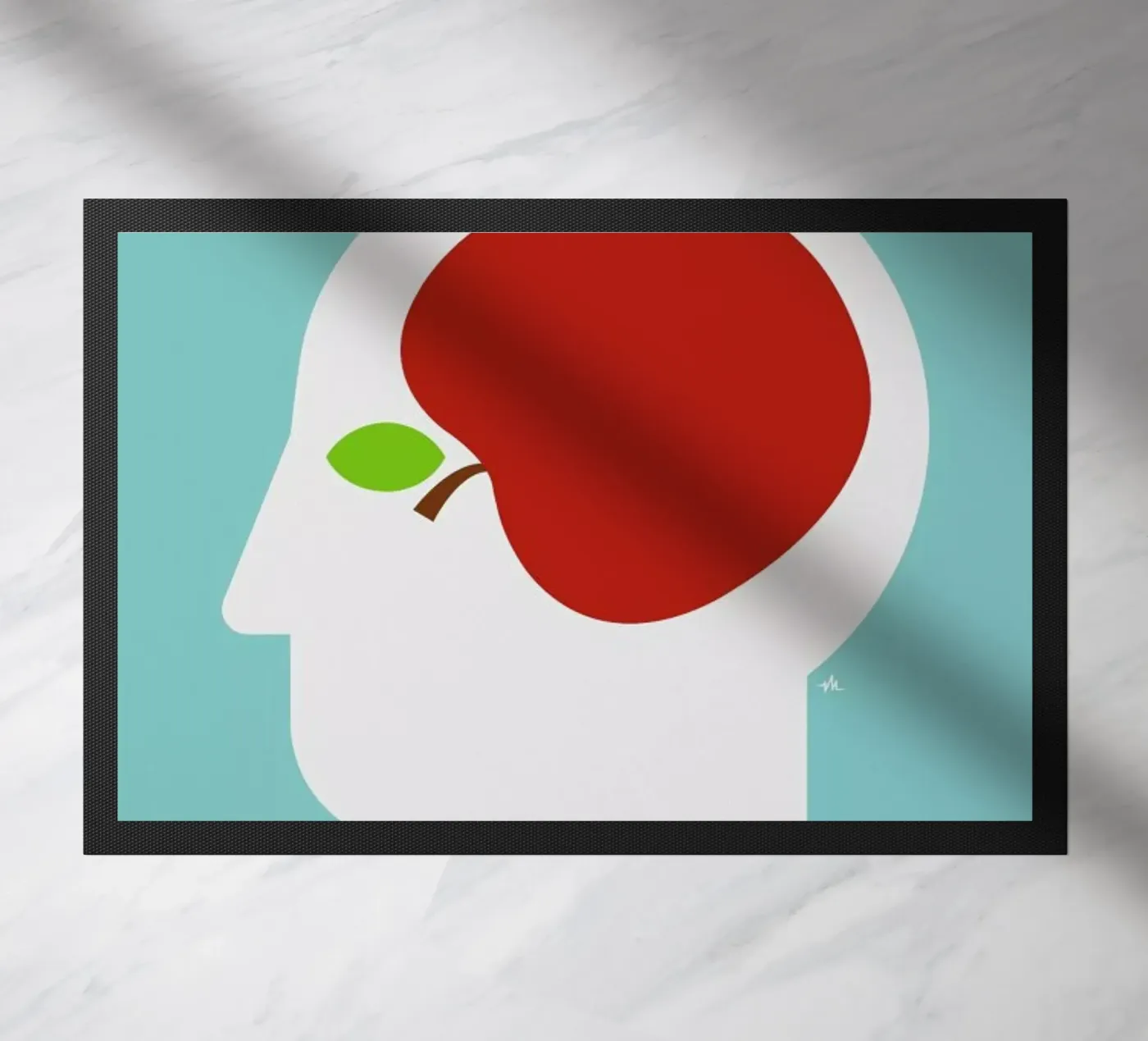 Apple head doormat by Viktor Hertz