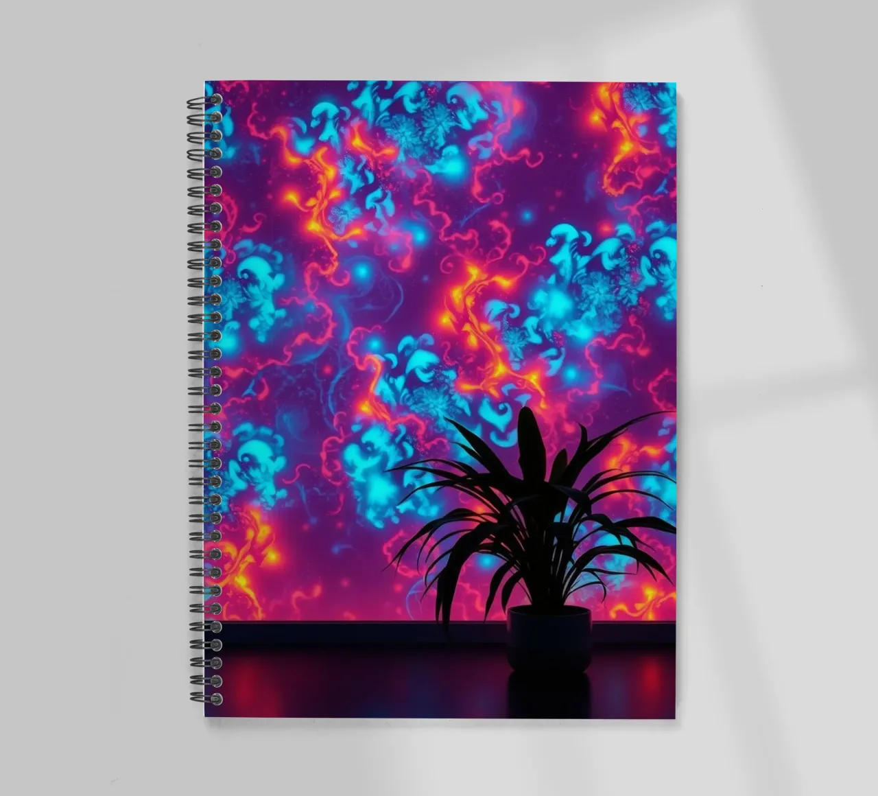 glowing patterns with a silhouette of a potted plant spiral notebook by DesignDoodle