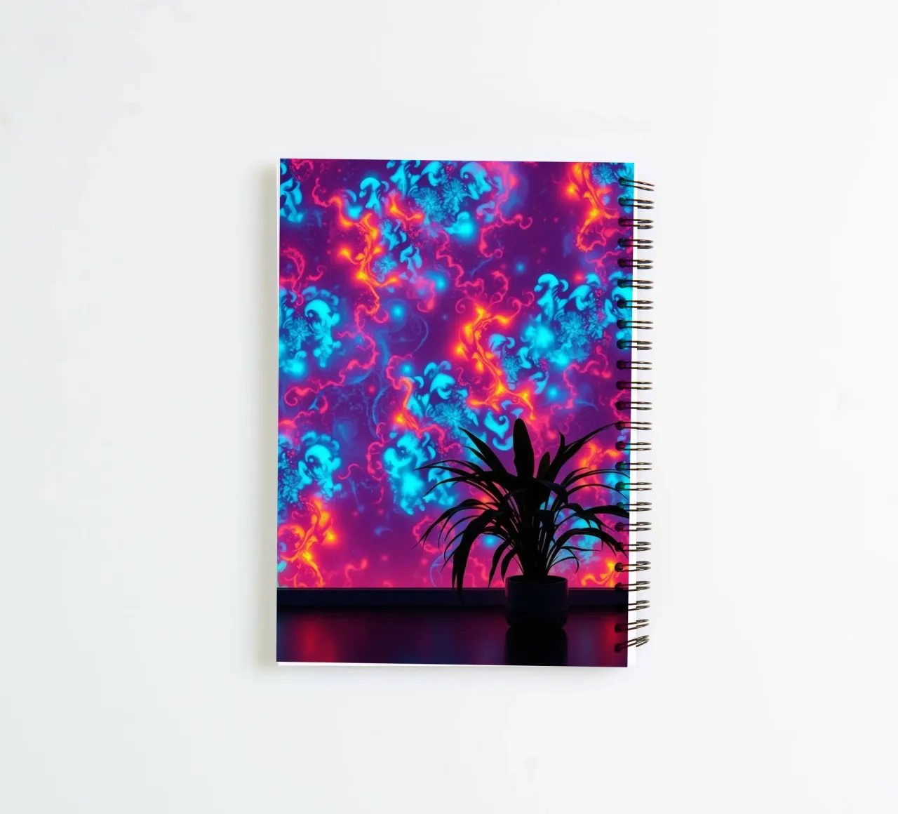 glowing patterns with a silhouette of a potted plant spiral notebook by DesignDoodle