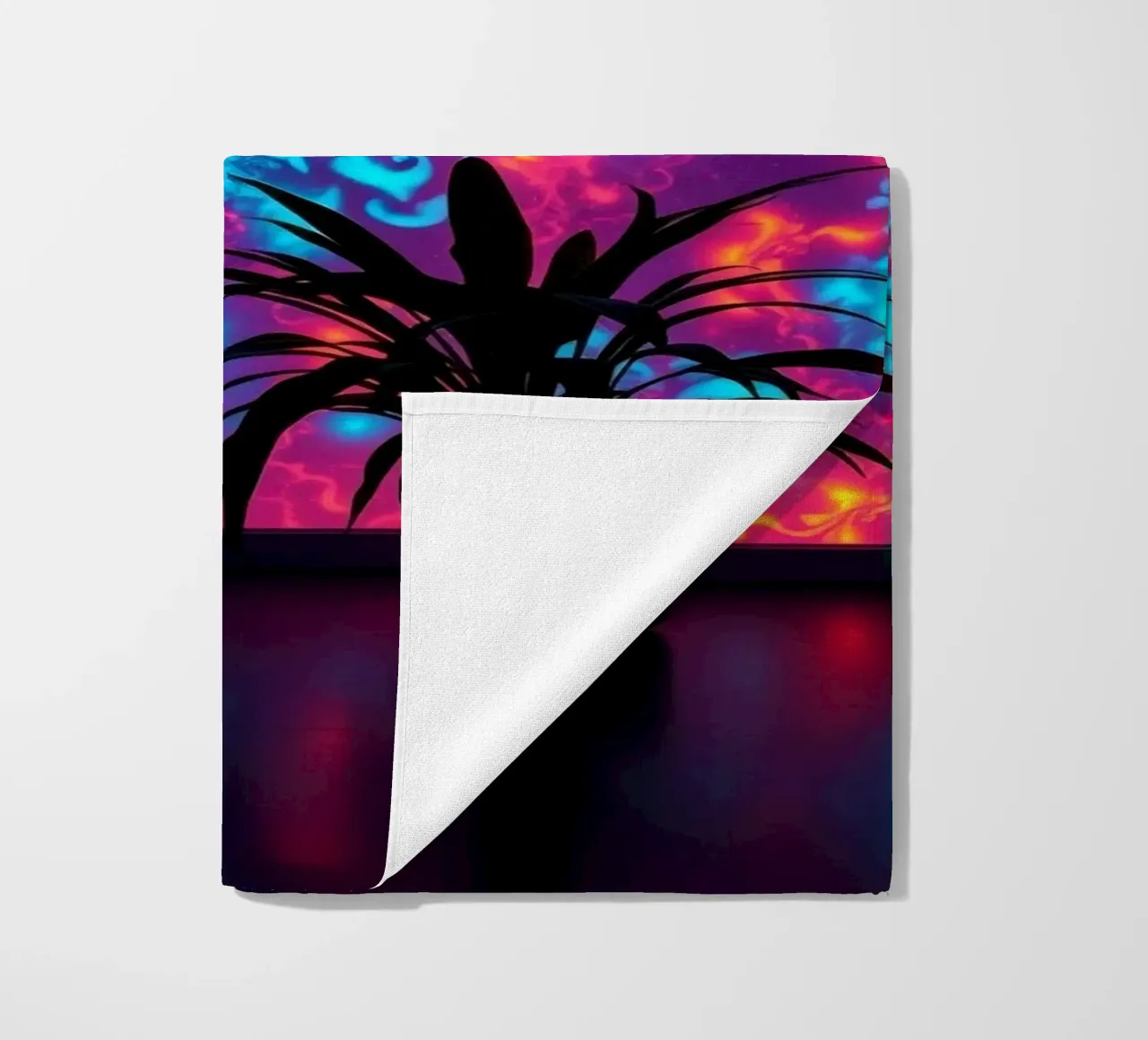 glowing patterns with a silhouette of a potted plant beach towel by DesignDoodle