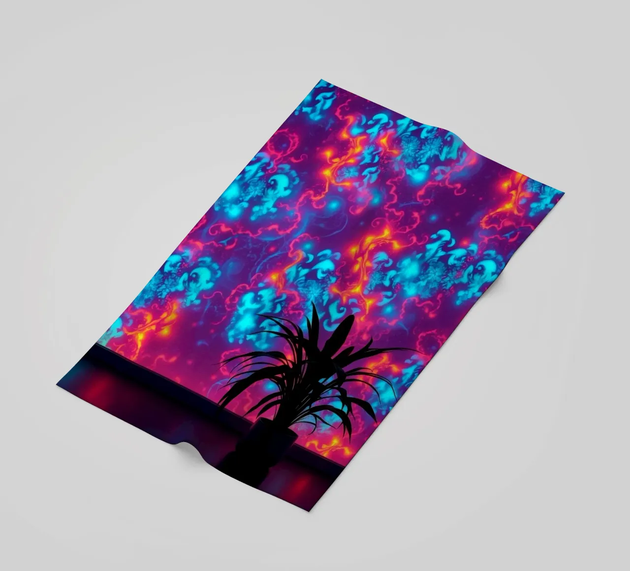 glowing patterns with a silhouette of a potted plant beach towel by DesignDoodle