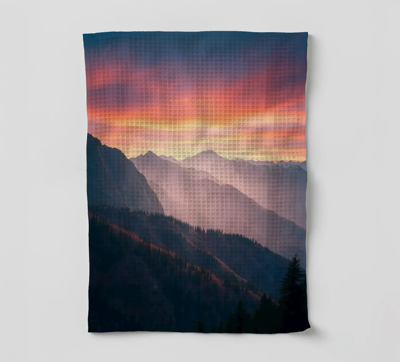Stunning sunset over mountains creates a calm and abstract tea towel by DesignDoodle