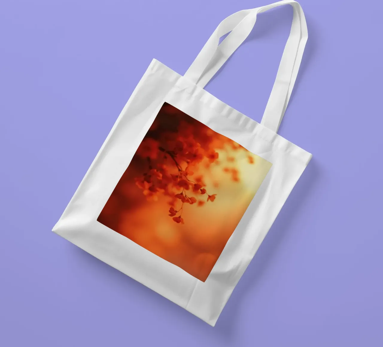 sfondo floreale arancione con soft focus borsa in juta da DesignDoodle