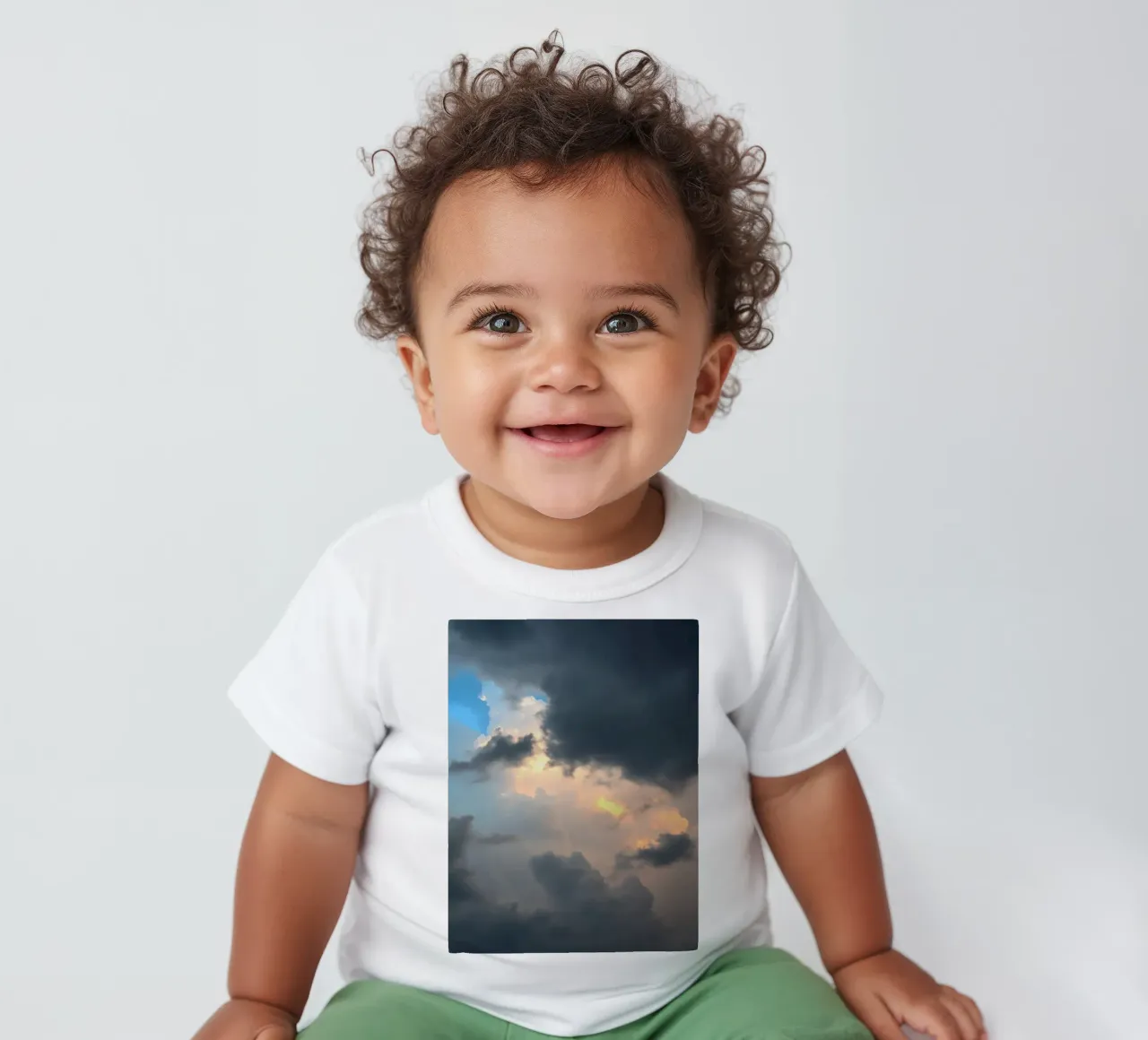 Dramatic cloud formations with hints of blue sky baby t-shirt by DesignDoodle