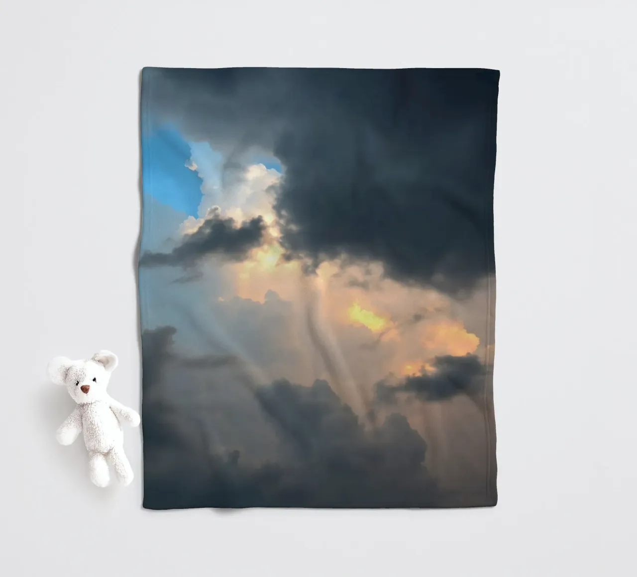 Dramatic cloud formations with hints of blue sky fleece blanket by DesignDoodle