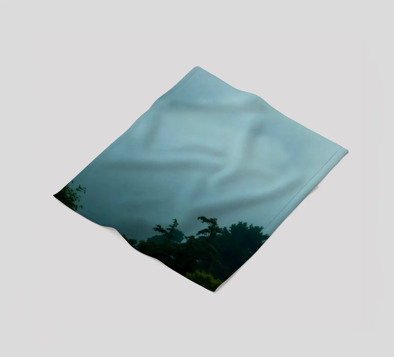 Foggy landscape with trees, creating calming atmosphere fleece blanket by DesignDoodle